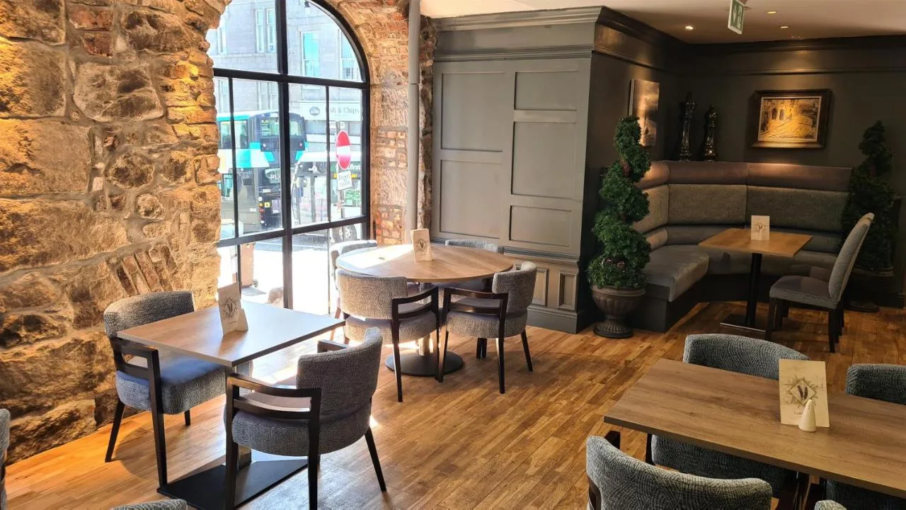 Stone-walled restaurant dining area at Aberdeen Douglas Hotel, Aberdeen city centre