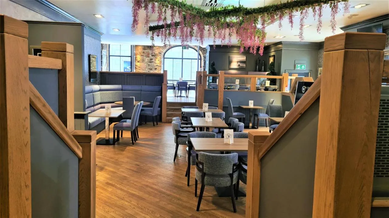Restaurant tables and chairs at Aberdeen Douglas Hotel near Aberdeen Station